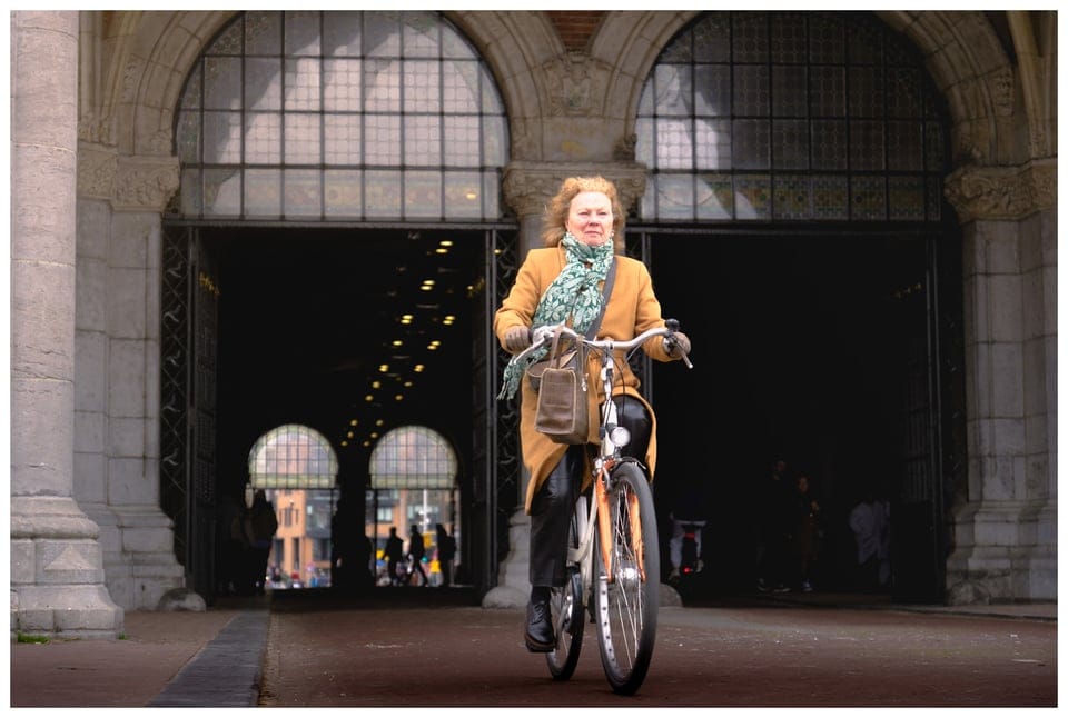 a woman riding a bicycle