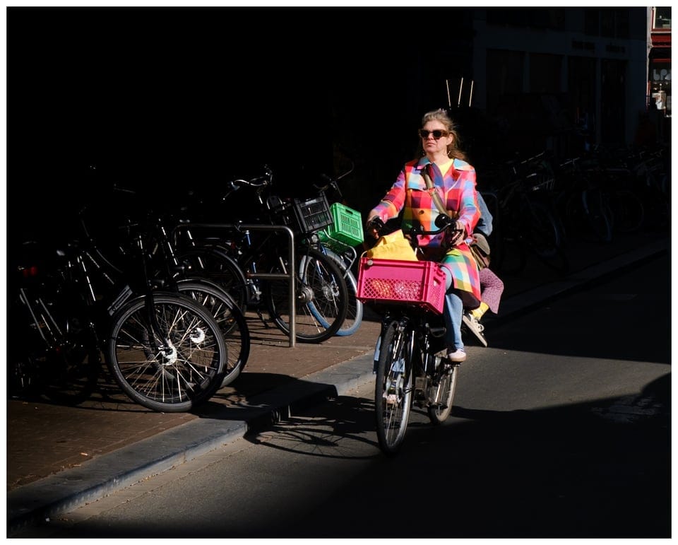 a woman riding a bike